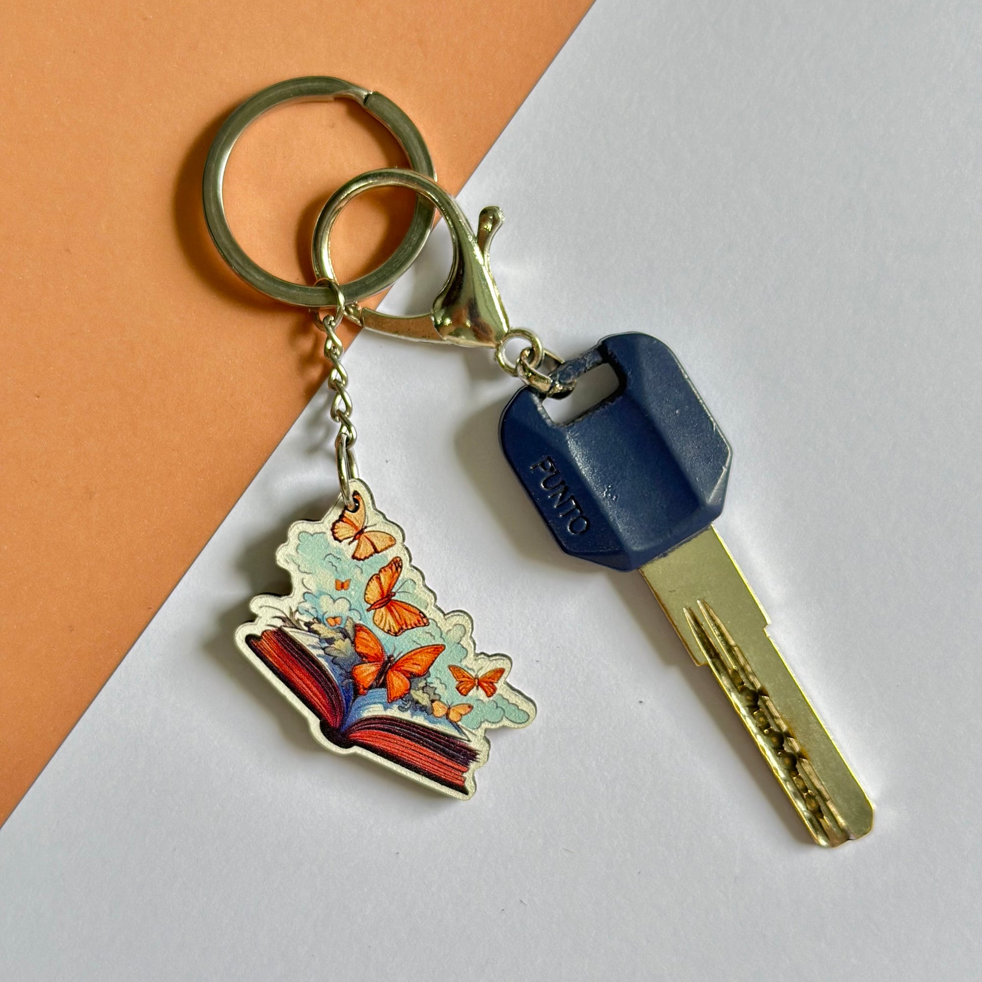 Book with butterflies keychain