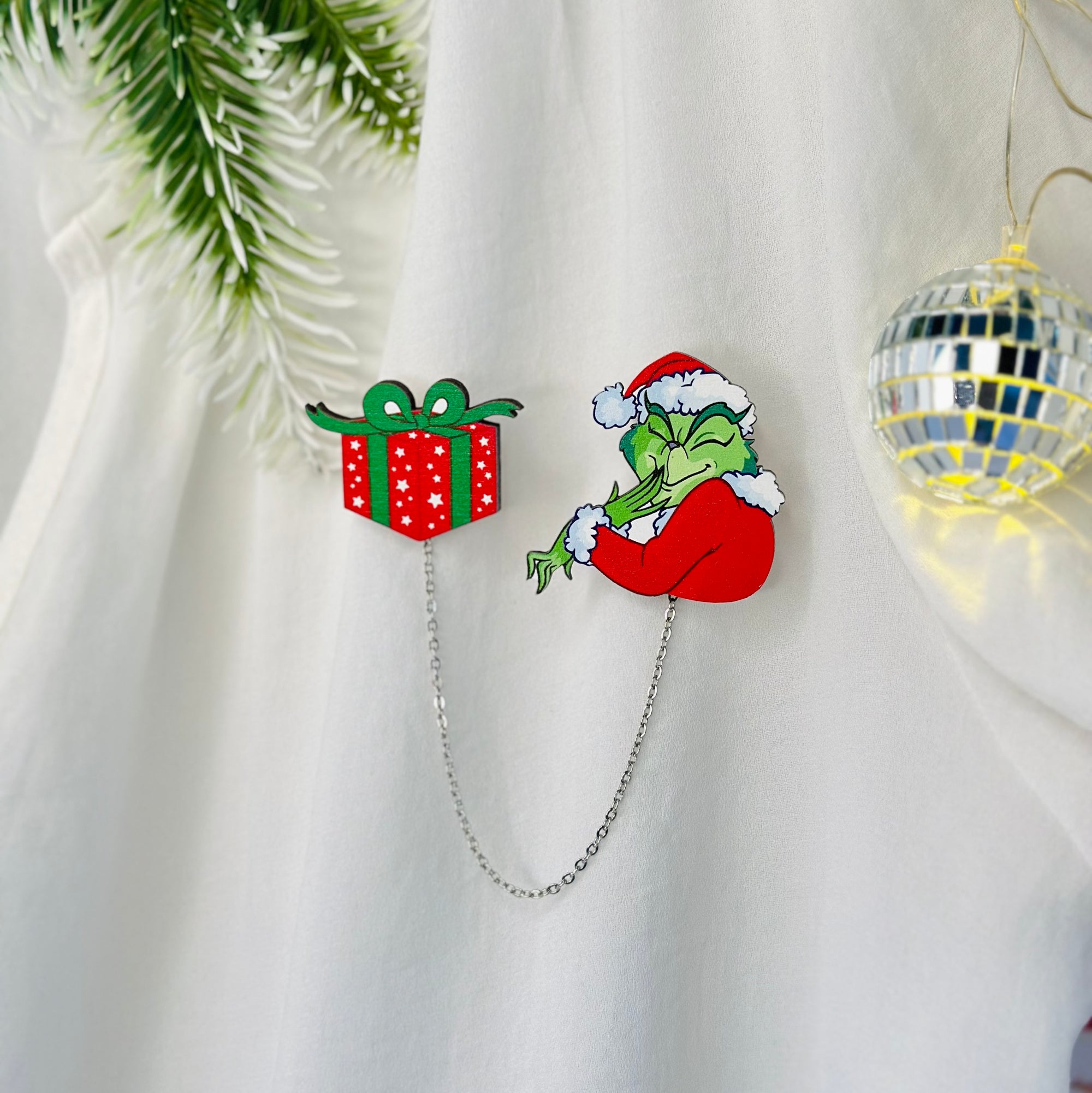 The Grinch and the gift of a clutch brooch