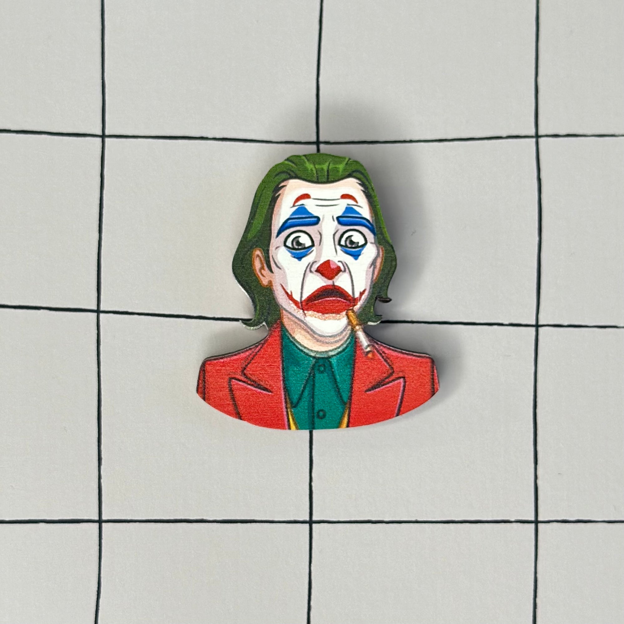 JOCKER brooch