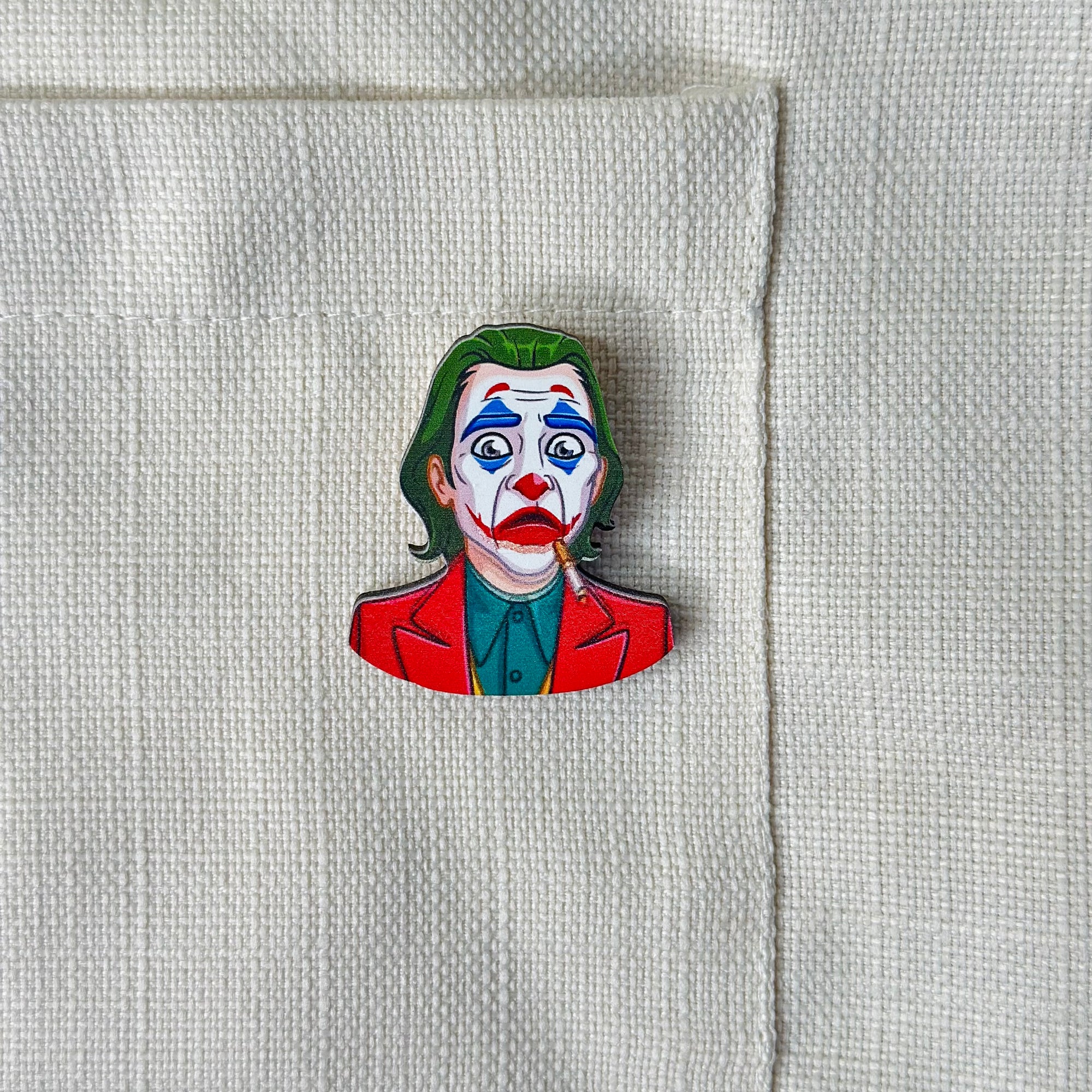 JOCKER brooch