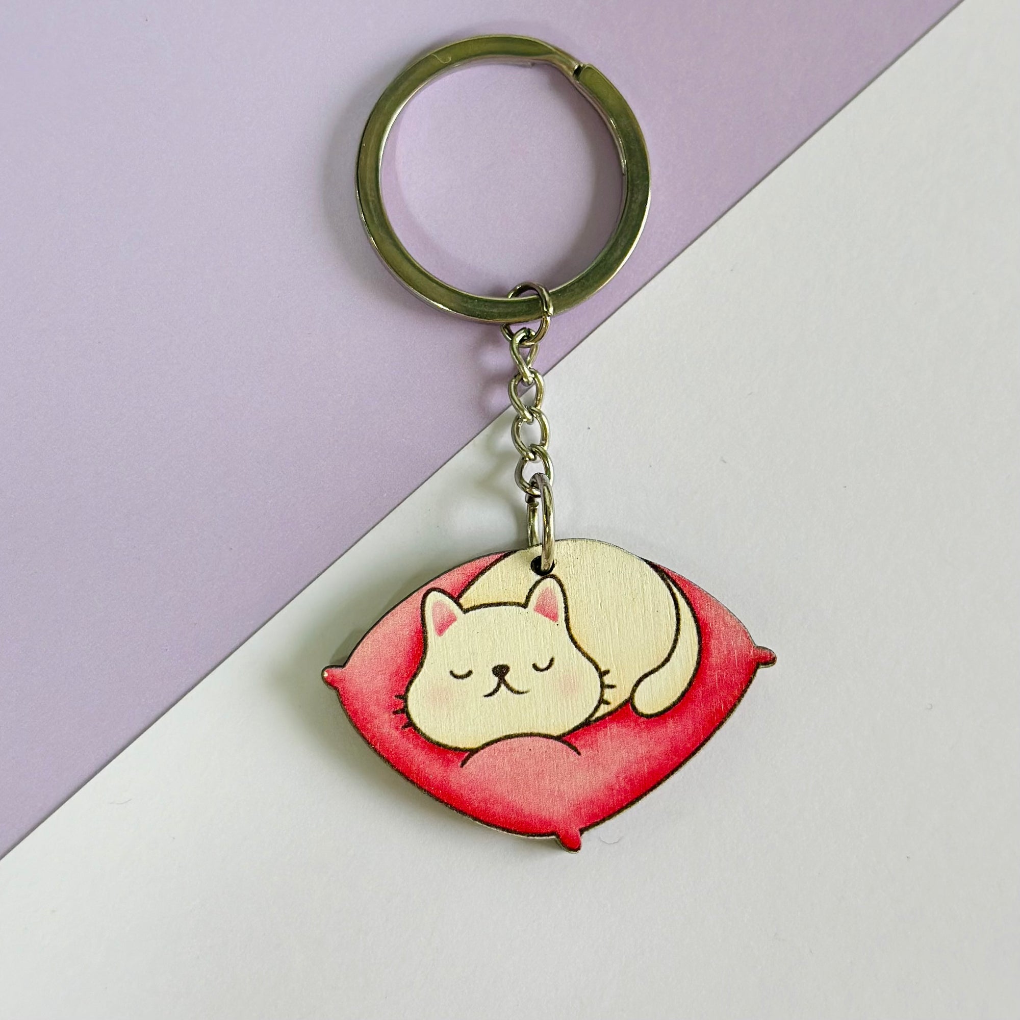 Cat on the pillow keychain