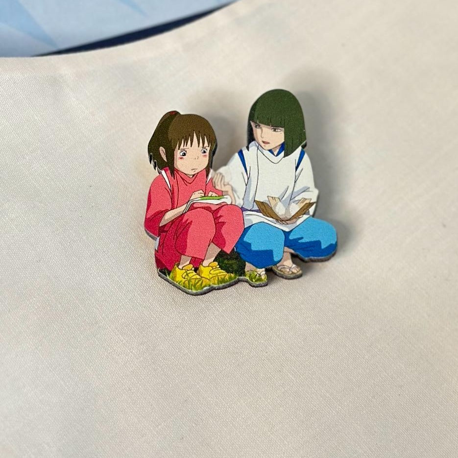 ანიმე Spirited Away: Chihiro Ogino & Haku გულსაბნევი აქსესუარი