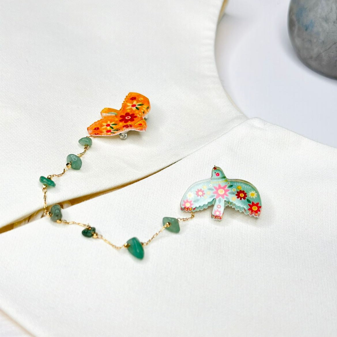 Birds with floral ornaments: organic glass brooch with natural aventurine stones