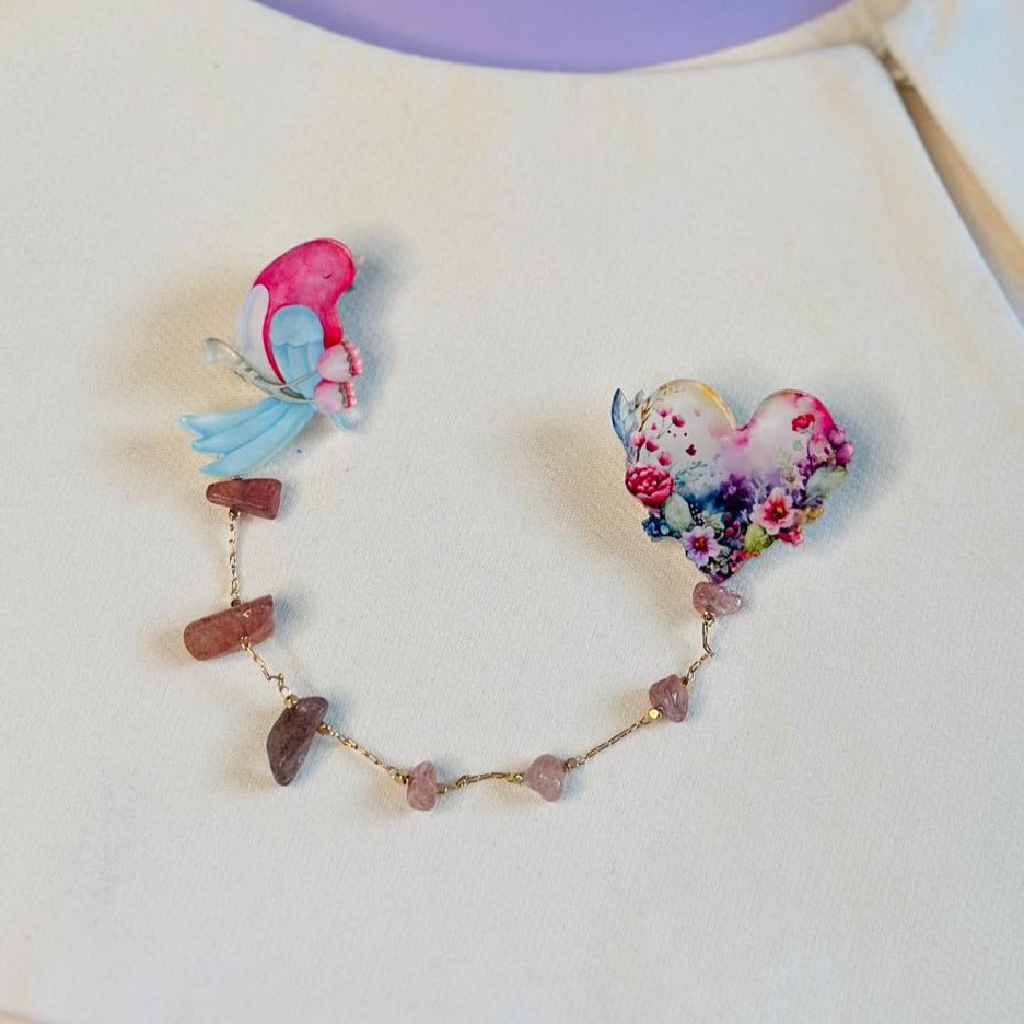 Organic glass brooch with natural stones: pink bird and heart with spring flowers