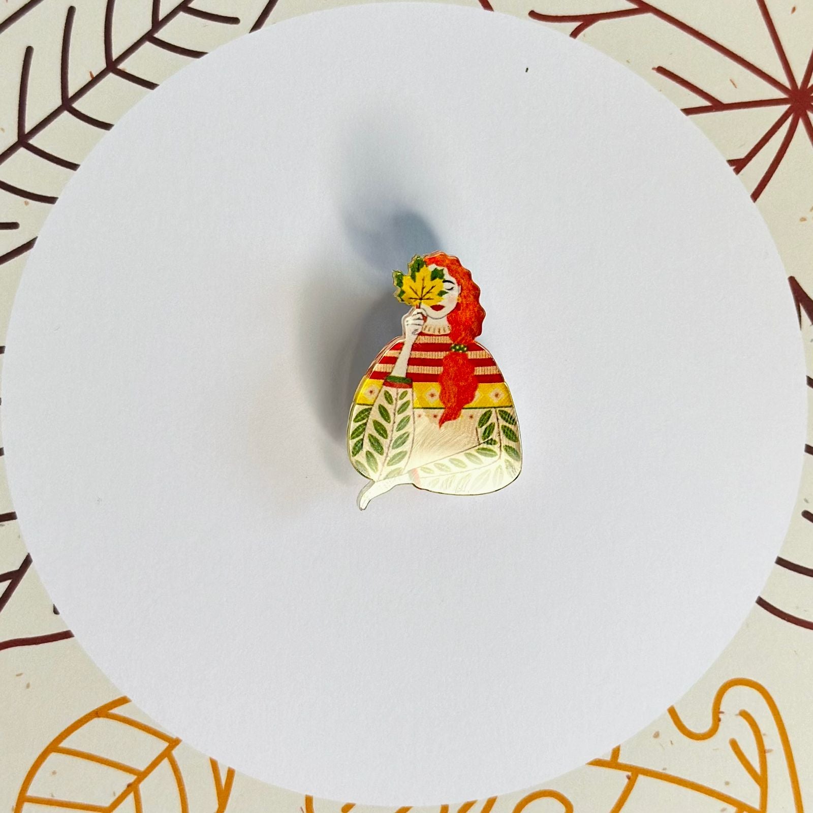 Girl with autumn leaf glass brooch