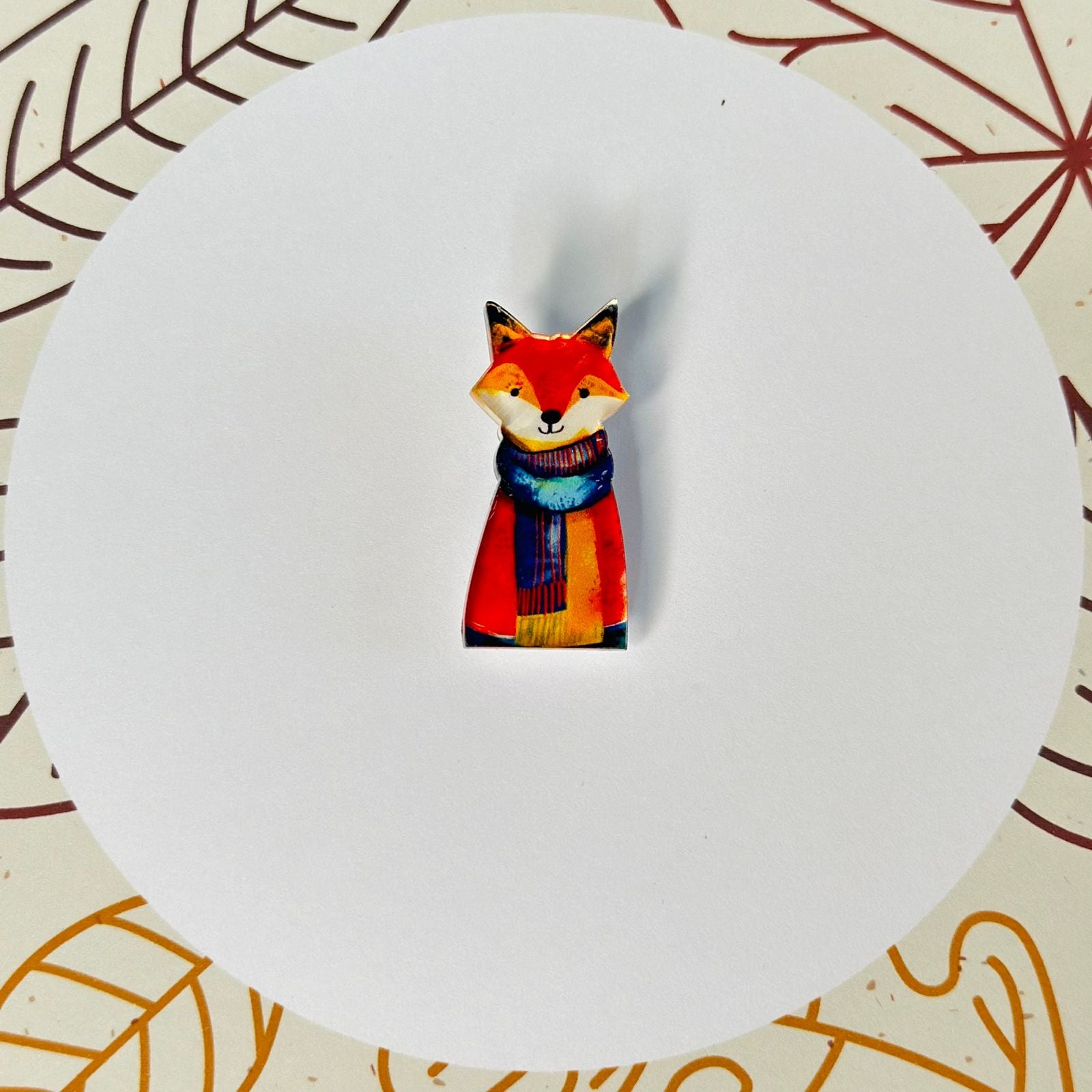 Fox colored amber glass brooch