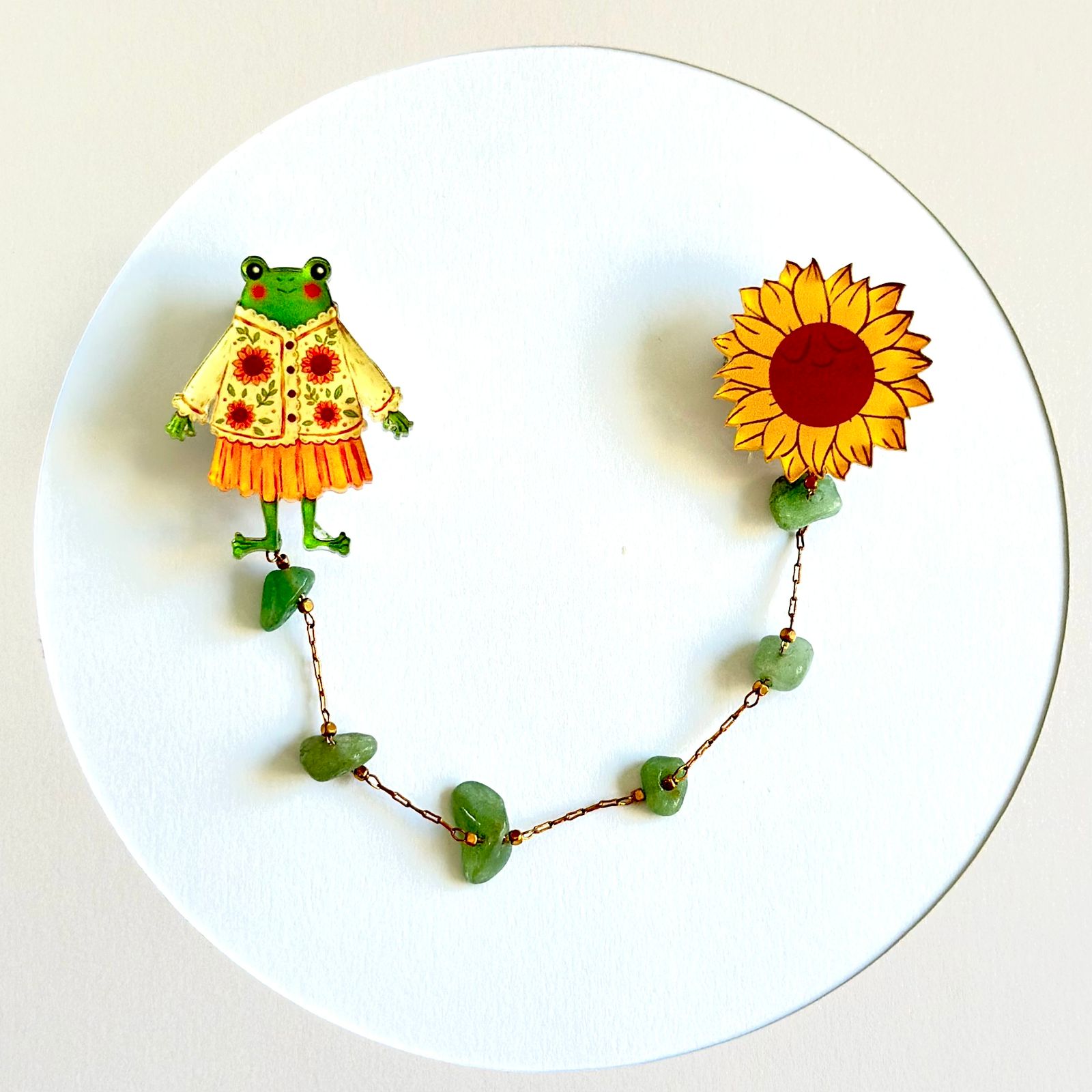 Green frog and sunflower organic glass brooch with natural stones.