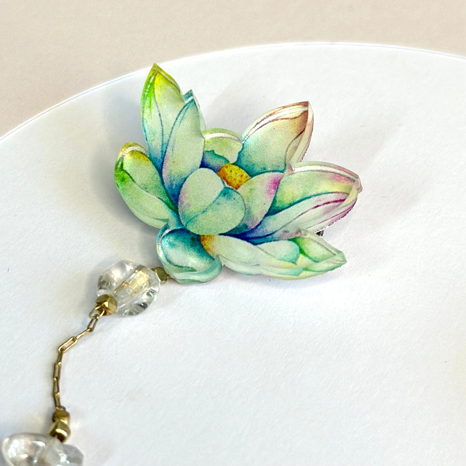 Lotus and Pink Butterfly: Organic glass brooch with natural white rock crystal stones